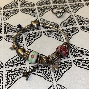 Childrens pandora bracelet & ring. Needs cleaning, pandora will clean for free.